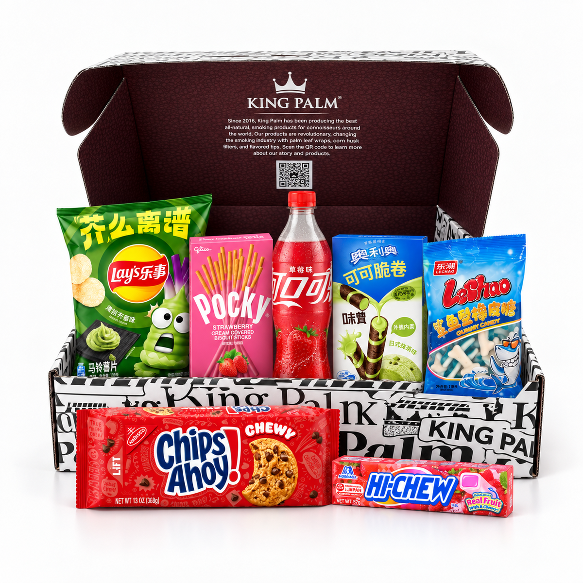 King Palm Active Snack Box open, with imported snacks: Lay's Wasabi, Pocky, Coca-Cola Strawberry, Oreo Wafer Roll, LeChao gummies, Chips Ahoy and Hi-Chew