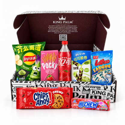 King Palm Active Snack Box open, with imported snacks: Lay's Wasabi, Pocky, Coca-Cola Strawberry, Oreo Wafer Roll, LeChao gummies, Chips Ahoy and Hi-Chew