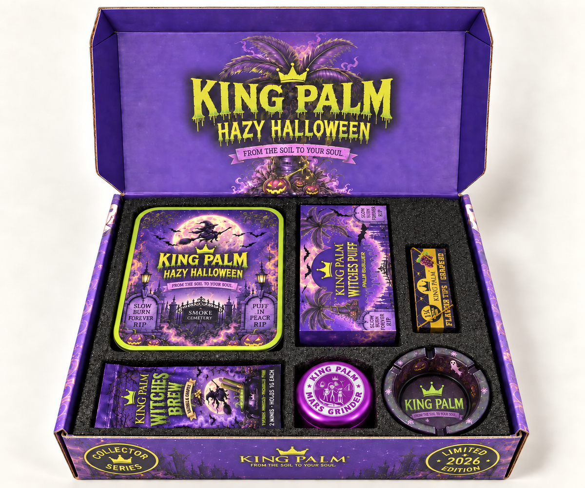 King Palm Hazy Halloween Box 2026 open, showing the Witches Puff bubbler, rolling tray, grape flavor tips, Witches Brew pouch, Mars grinder and glass ashtray