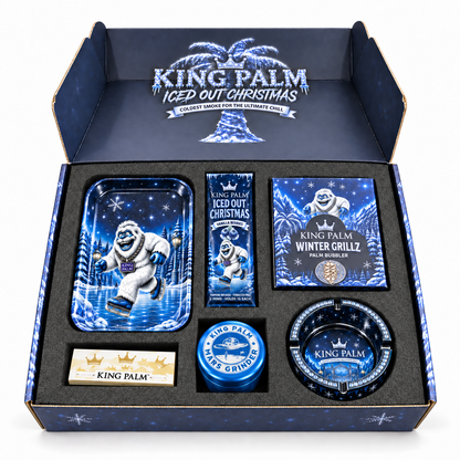 King Palm Iced Out Christmas Box 2026 open, showing the yeti rolling tray, Vanilla Berries pouch, Winter Grillz bubbler box, Gelato Cream flavor tips, blue Mars grinder and glass ashtray