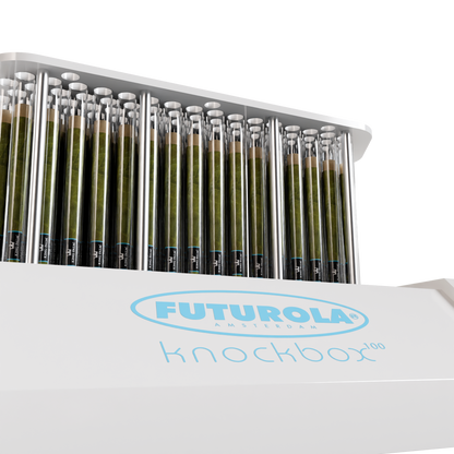 Close up of palm leaf cones standing in a Futurola Knockbox 100 rack