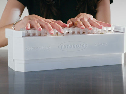Crowning 100 filled shells at once on the KB 100 Standard Dutch Crown Device